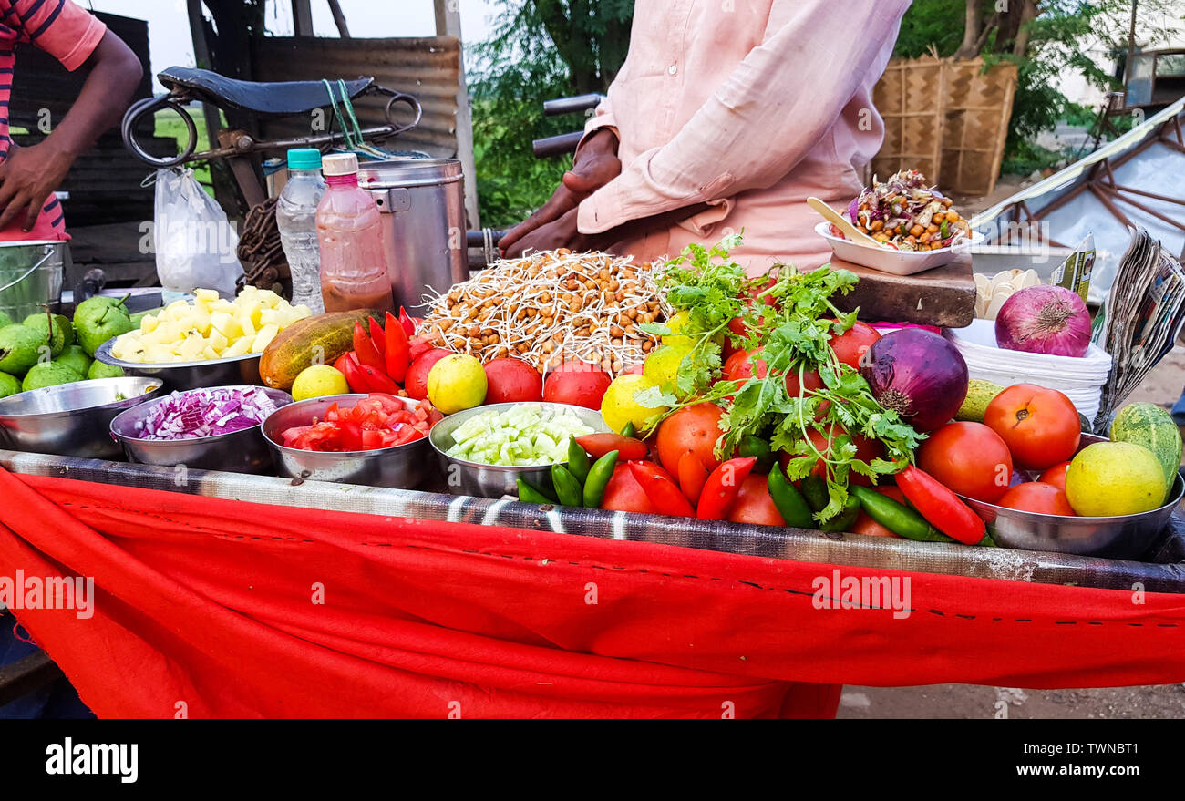 indian street food vendor selling spicy chickpea bengal gram chole