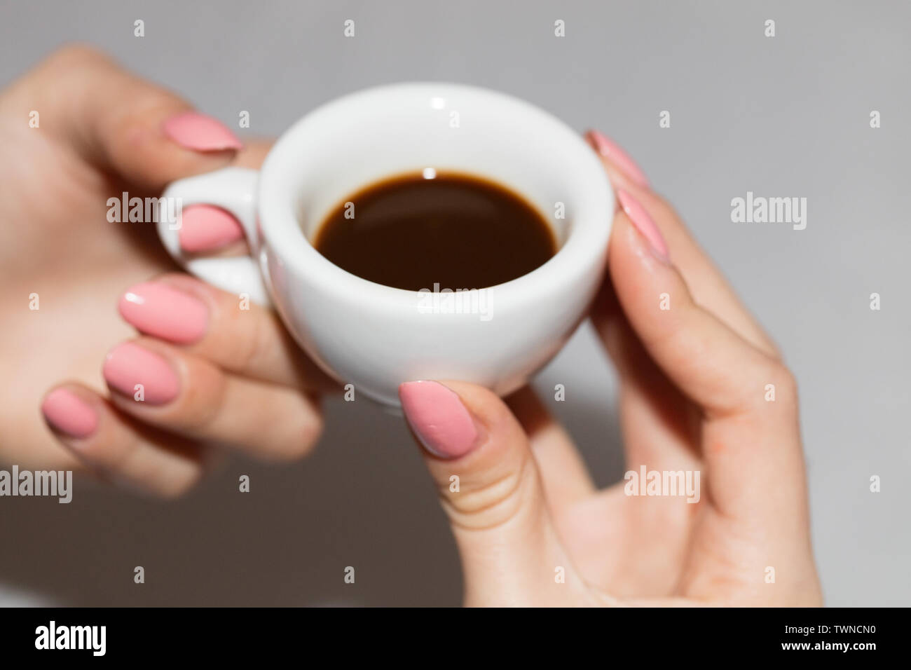 Taking the neapolitan coffee in ceramic cup Stock Photo