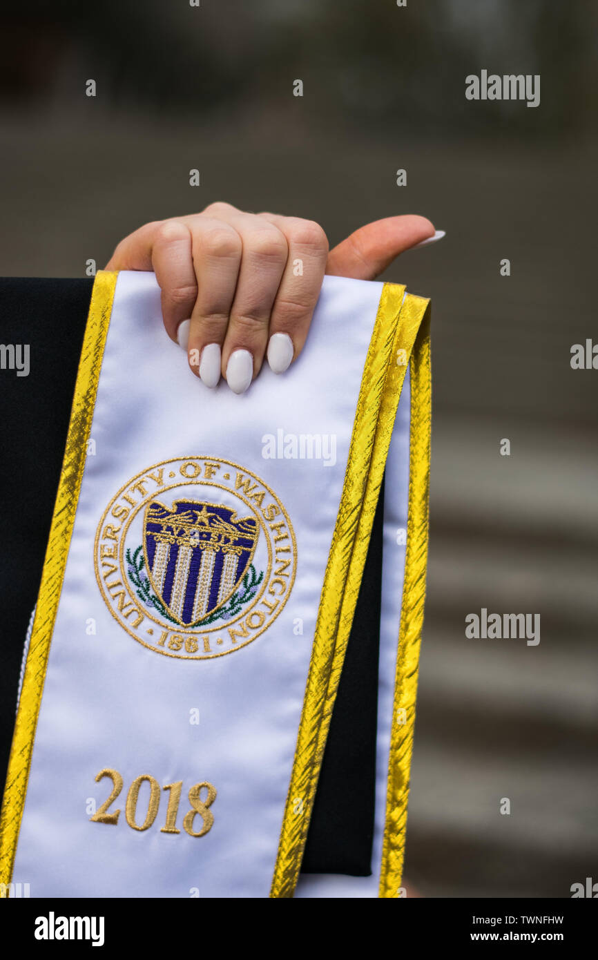 Girl holding sash at University of Washington Graduation Stock Photo