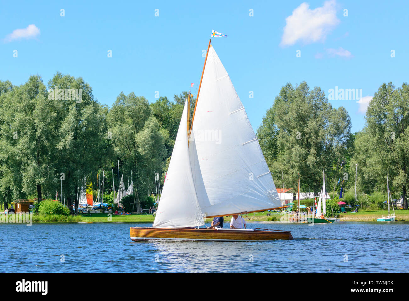 Sailing on inland lake in summertime Stock Photo