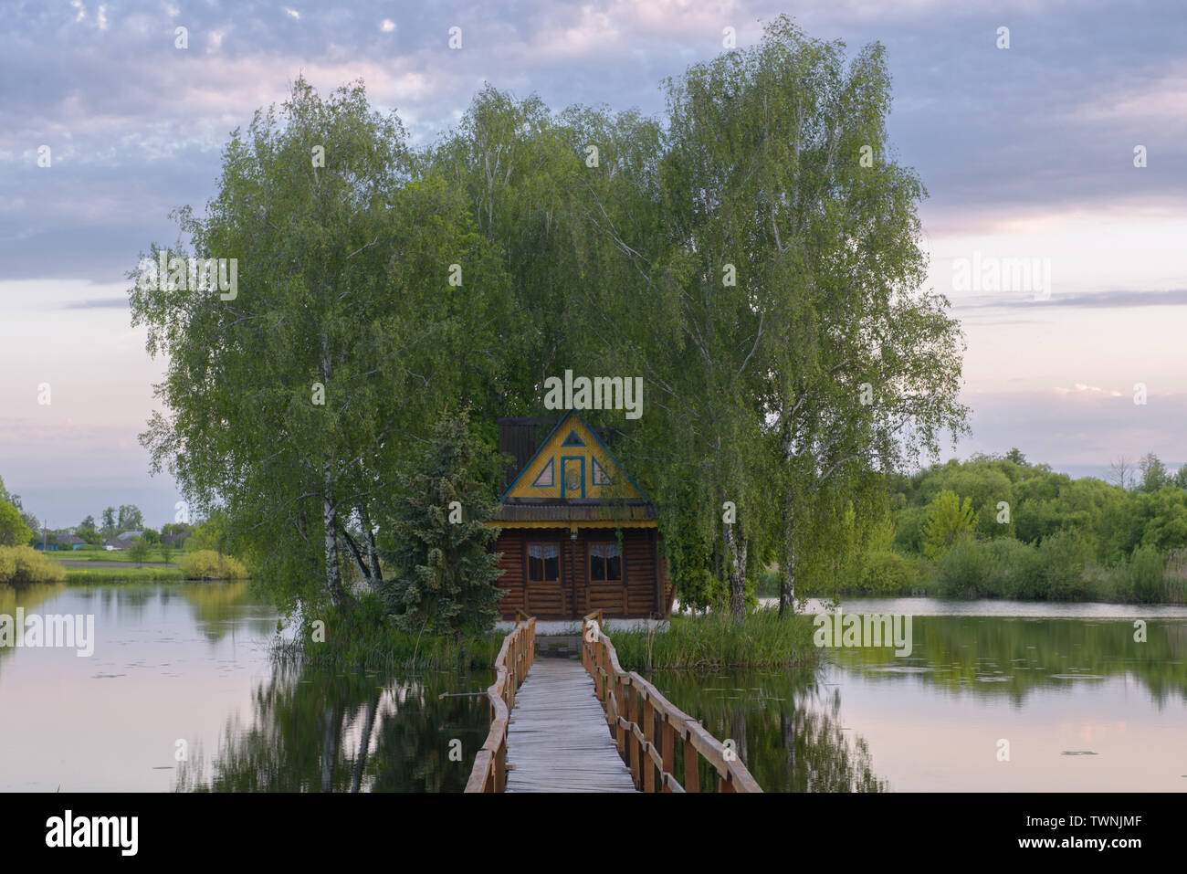A small fisherman's house in the middle of the river Stock Photo - Alamy