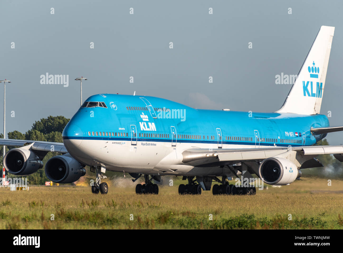 A picture of an KLM Boeing 747 taking off from Schiphol airport Stock Photo