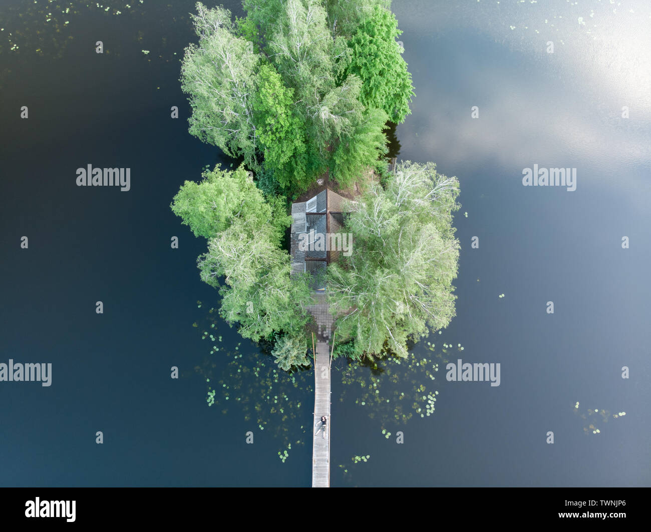 A small fisherman's house in the middle of the river Stock Photo - Alamy
