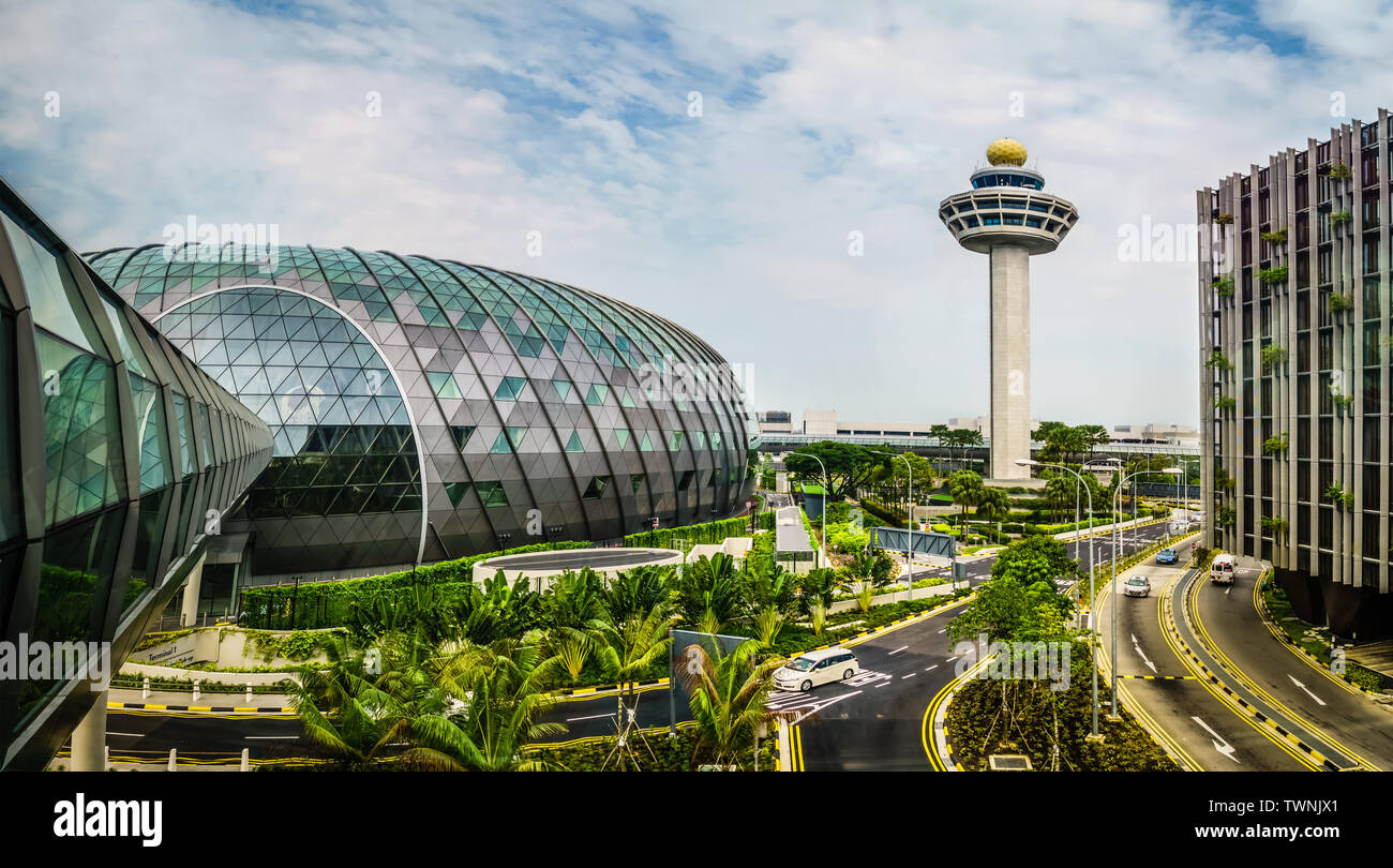 Singapore - May 1,  2019: Exterior view of Jewel and Control Tower. Jewel Changi Airport is a mixed-use development at Changi Airport in Singapore, op Stock Photo