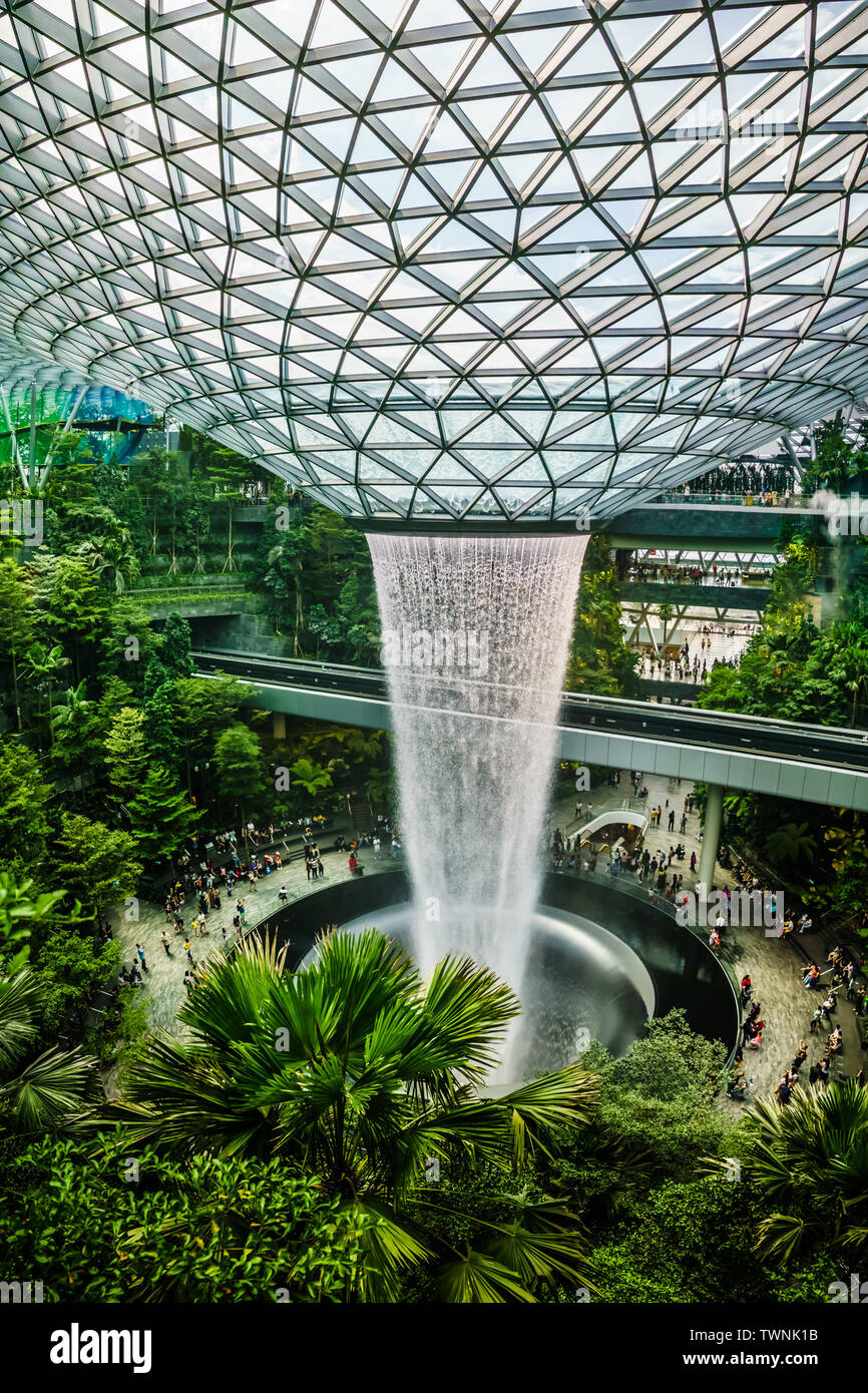 Singapore - Jun 11,  2019: HSBC Rain Vortex. Jewel Changi Airport is a mixed-use development at Changi Airport in Singapore, opened in April 2019. Stock Photo