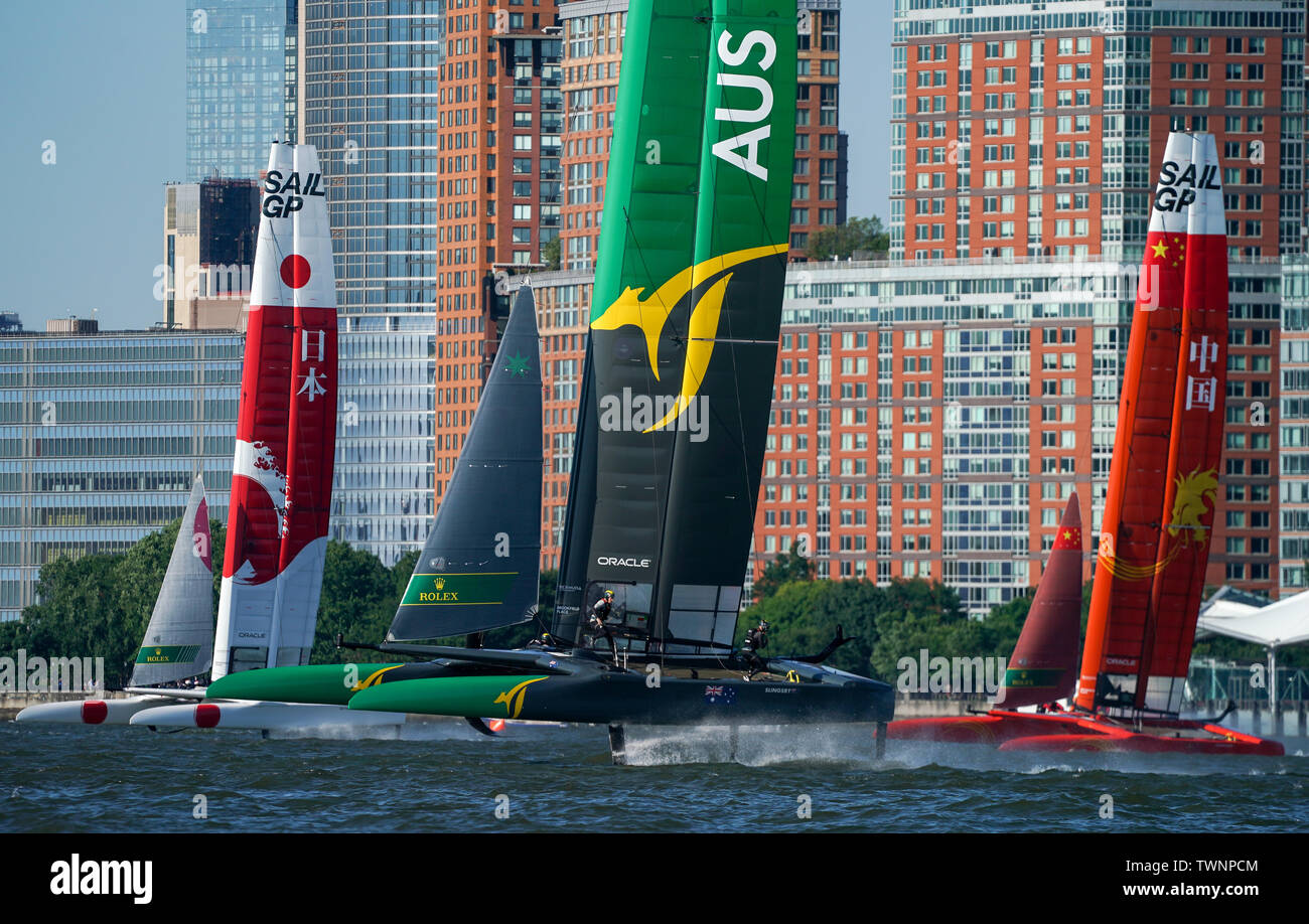 Australia SailGP Team (centre) leads Japan SailGP Team (right) and