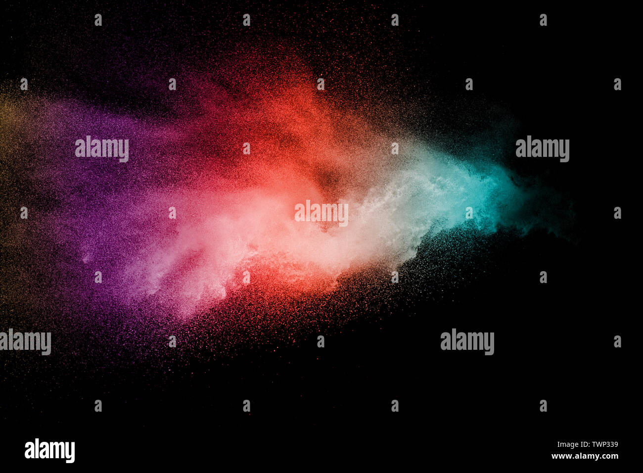 Vibrant color of powder explosion on black background Stock Photo - Alamy