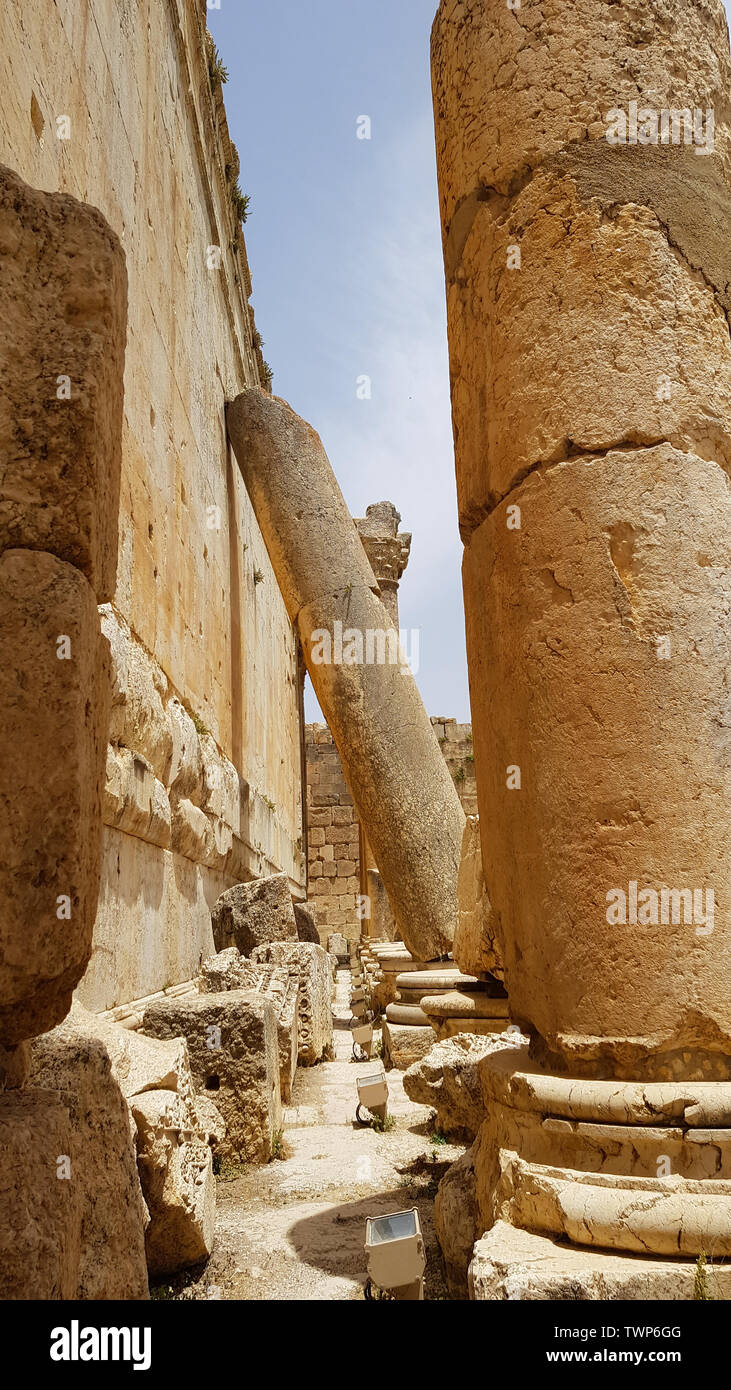 Columns of the Temple of Bacchus. The ruins of the Roman city of Heliopolis or Baalbek in the Beqa Valley. Baalbek, Lebanon - June, 2019 Stock Photo