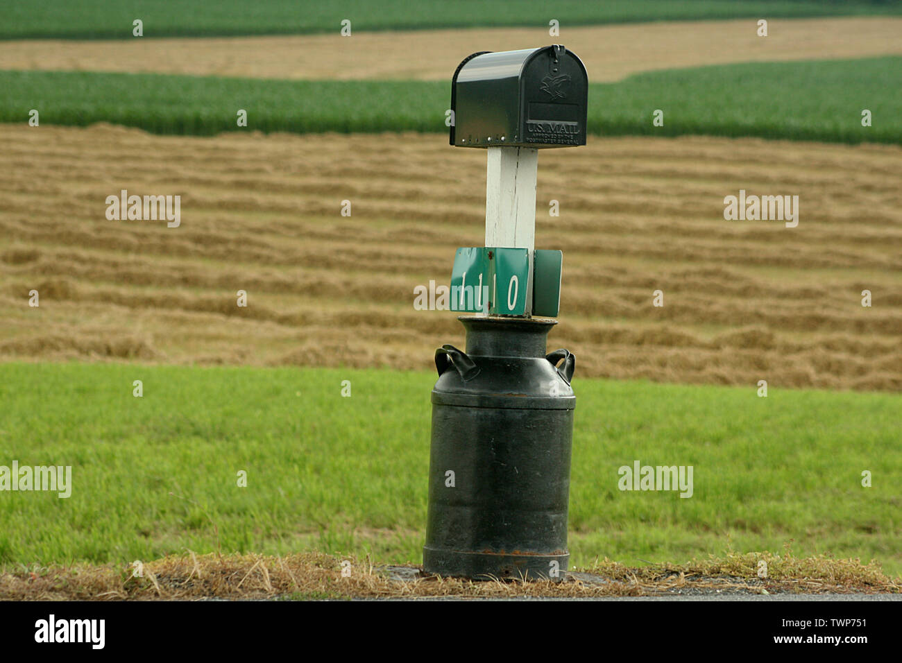 Old milk container turned into a mailbox base in Lancaster County, PA, USA Stock Photo