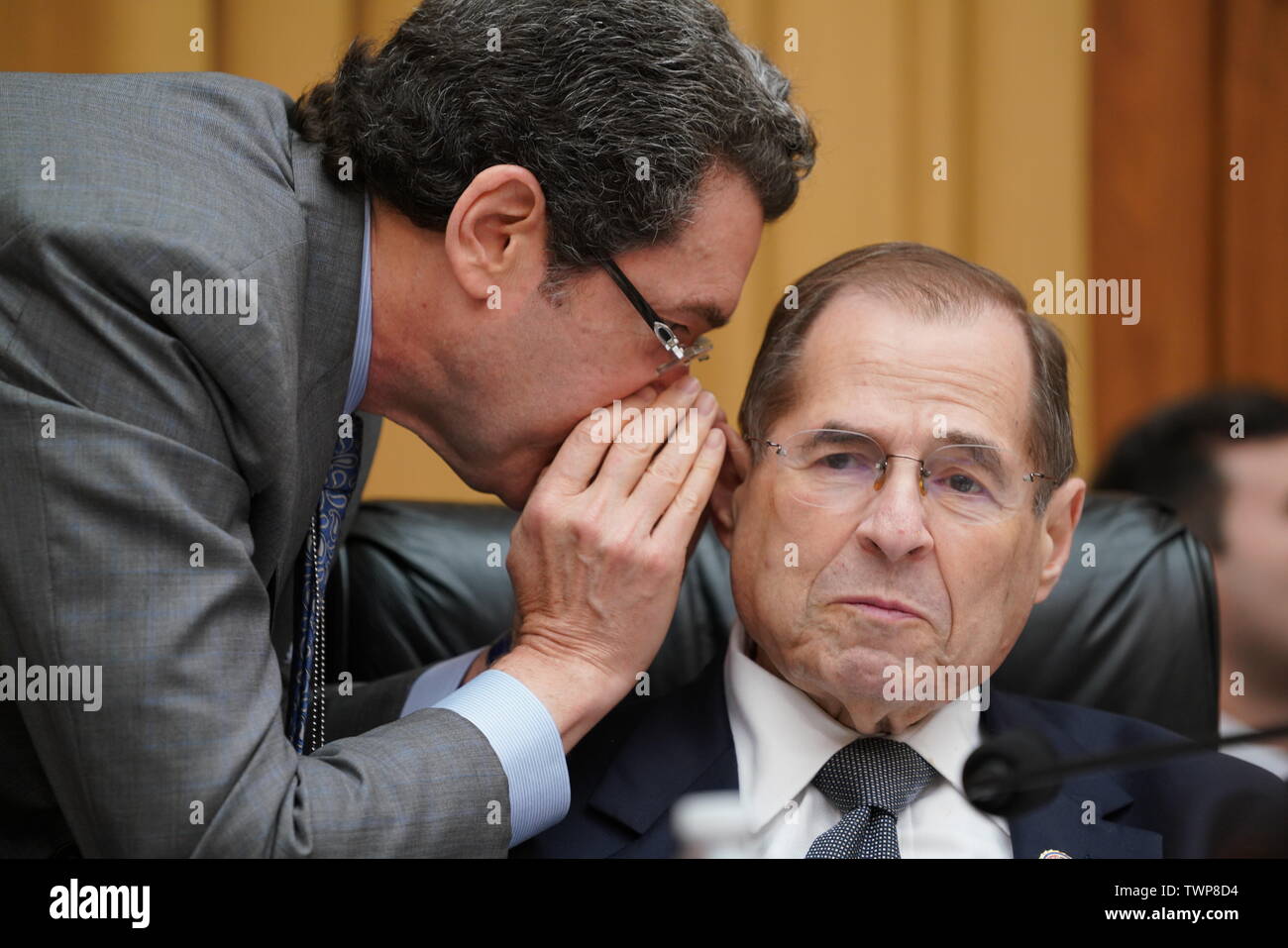 June 20, 2019 - Washington, District of Columbia, U.S. - NORM EISEN (left) speaks to Rep. JERROLD NADLER, D-NY, as Nadler prepares to chair the House Judiciary Committee as it holds the latest in a series of hearings on the Mueller report. Eisen is a Brookings Institution fellow, a former White House lawyer in the Obama administration and an outspoken Trump critic, and is serving as part-time counsel to the committee to help Nadler conduct oversight of the Justice Department and special counsel R. Mueller's Russia probe. The committee has been under pressure from some Democrats to begin impeac Stock Photo