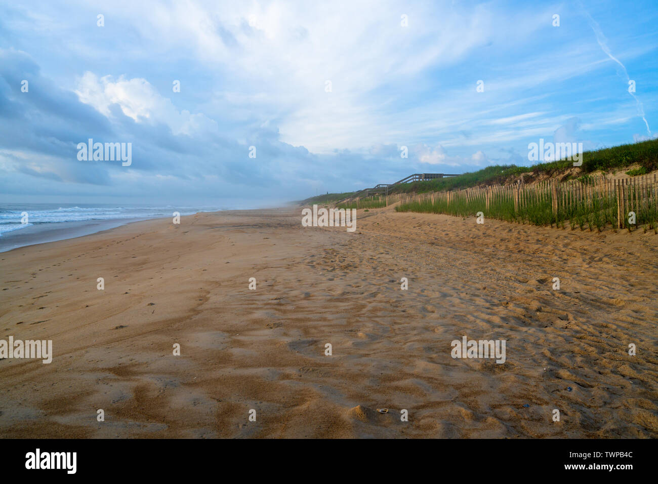 An early morning wideangle landscape shot of a beach in Duck, NC on a