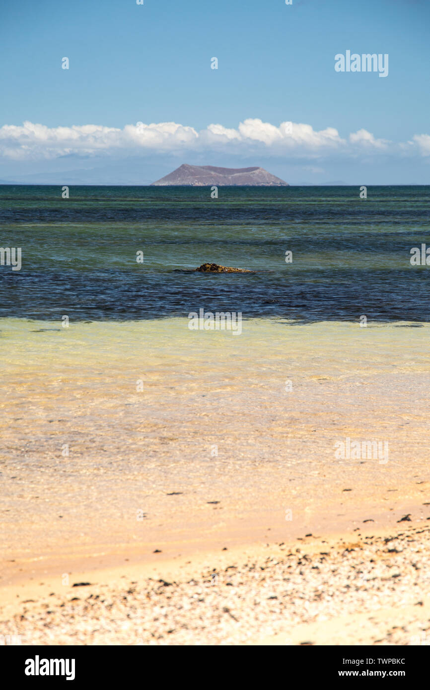 Baltra was hired to the US in order to monitor the Pacific theater of the II World War. One of two old runways is on use now for commercial flights. Stock Photo