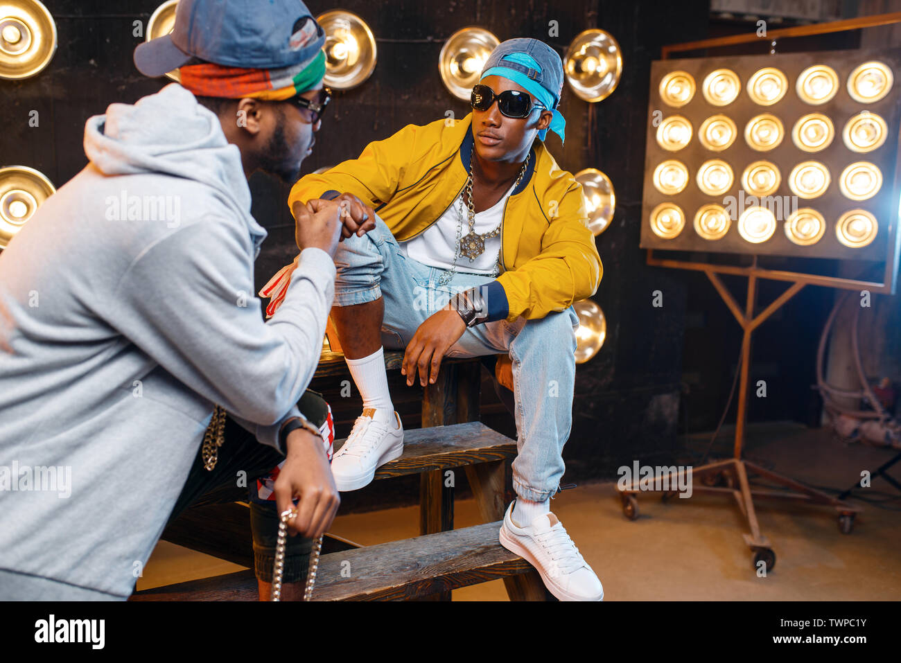Black rappers in sunglasses, perfomance on stage Stock Photo - Alamy