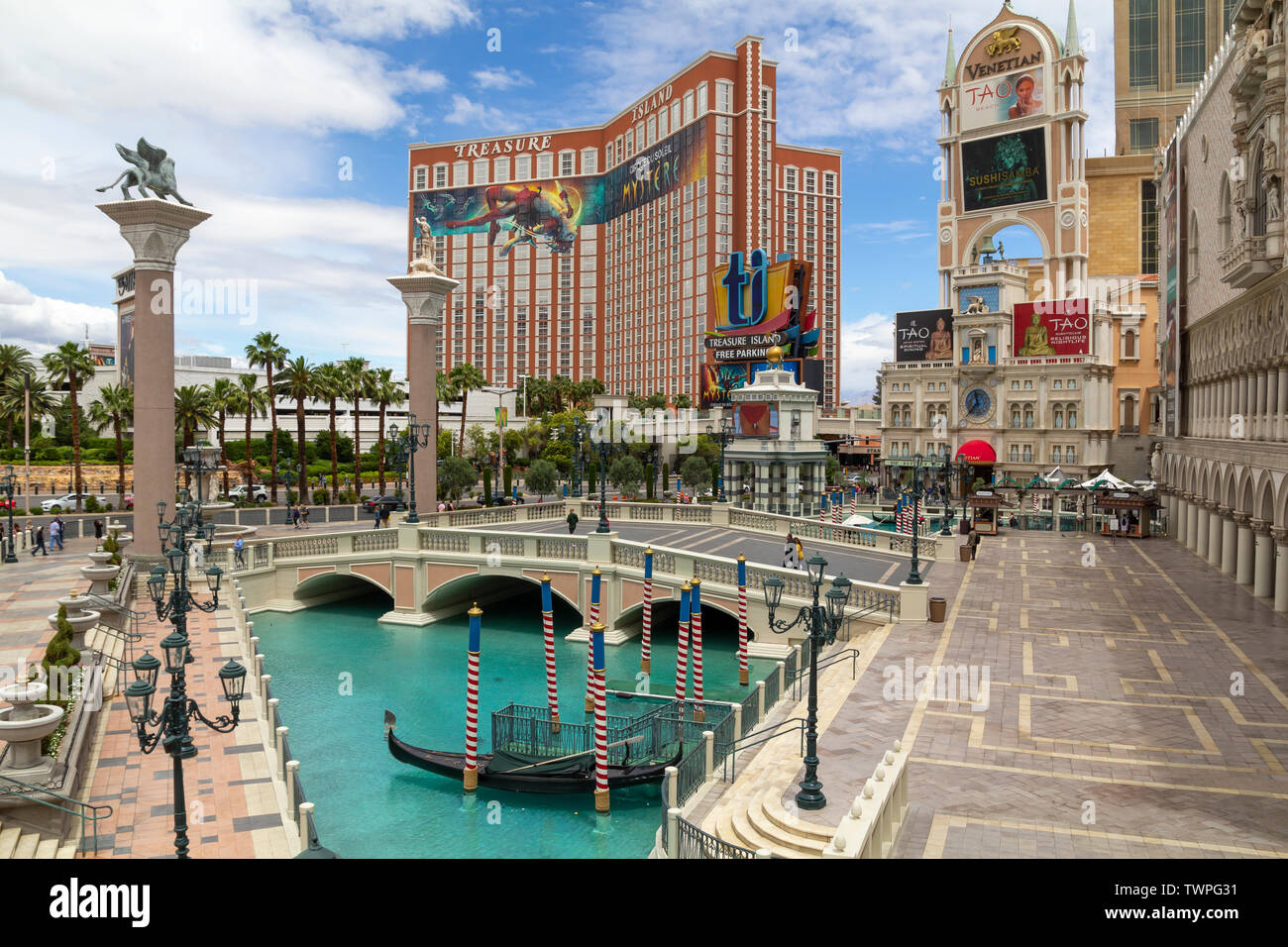 Las Vegas Strip, casino and hotels city view at daytime from the street.Treasure Island and The Veneti Stock Photo