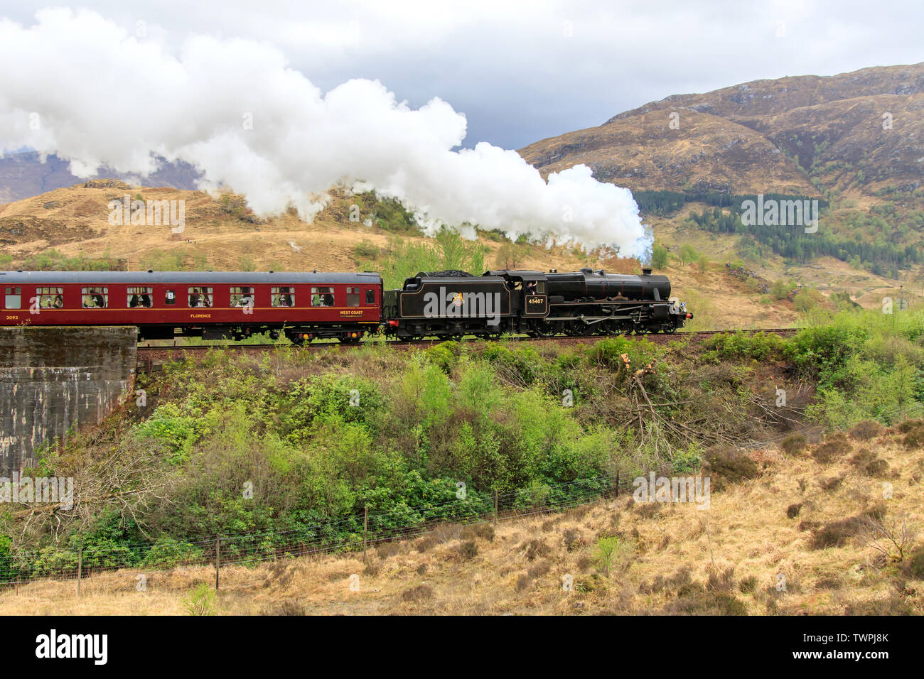 Jacobite Steam Train Crossing The Famous Glenfinnan Viaduct Stock Photo ...