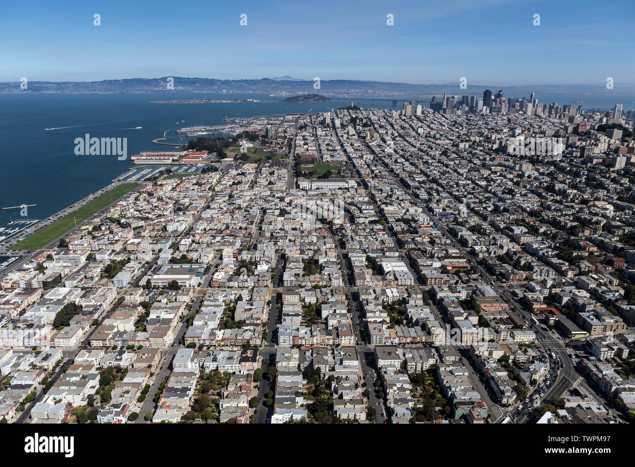 Afternoon aerial view of Marina District streets, homes and buildings in San Francisco Afternoon aerial view of Marina District streets, homes and buildings in San Francisco