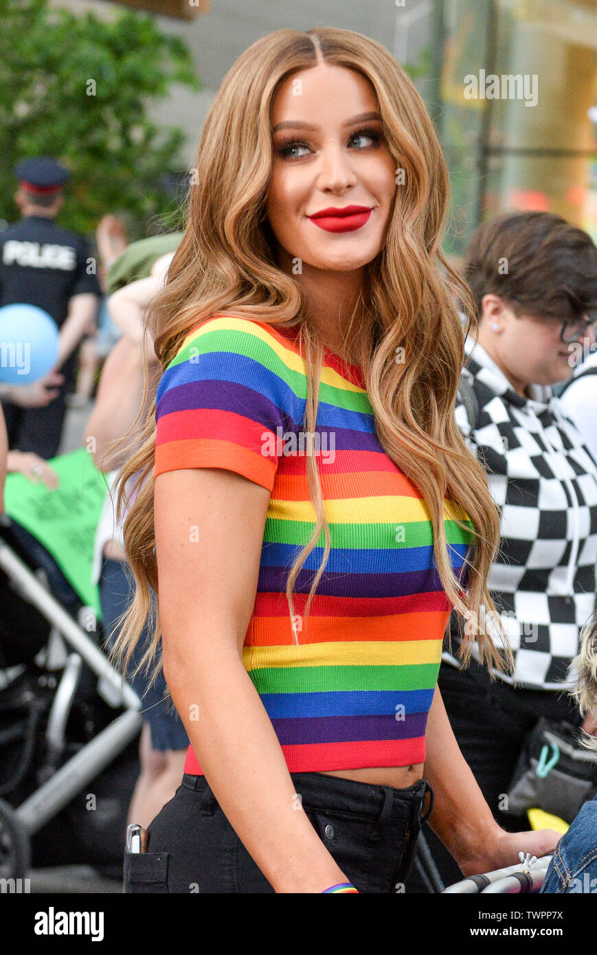A woman with LGBT colours during the Trans march.Spectators displayed their support towards the transgender and non-binary people while demonstrating on the streets of Toronto in a Trans March during the Pride Month. Stock Photo