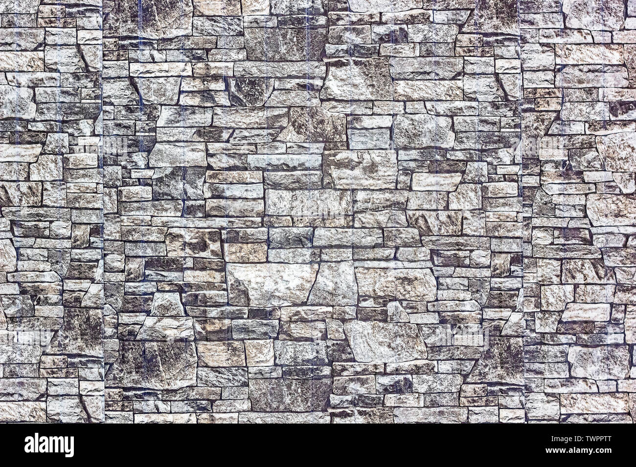 A wall of gray stone. Stone wall texture background natural color Stock ...