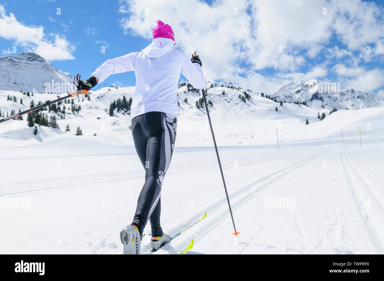 Couple during crosscountry skiing exercise in classical style in