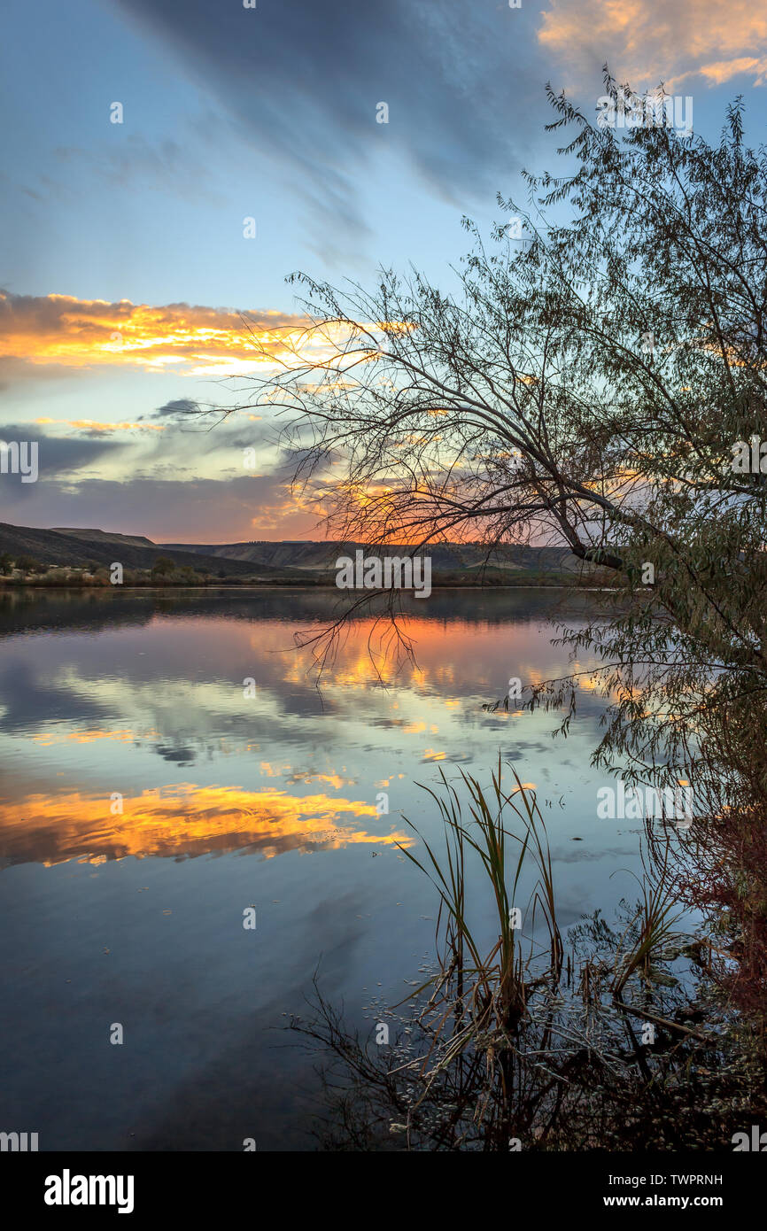 The sun sets on the Snake River at Three Island State Park, Glenn's Ferry, Idaho, USA Stock Photo
