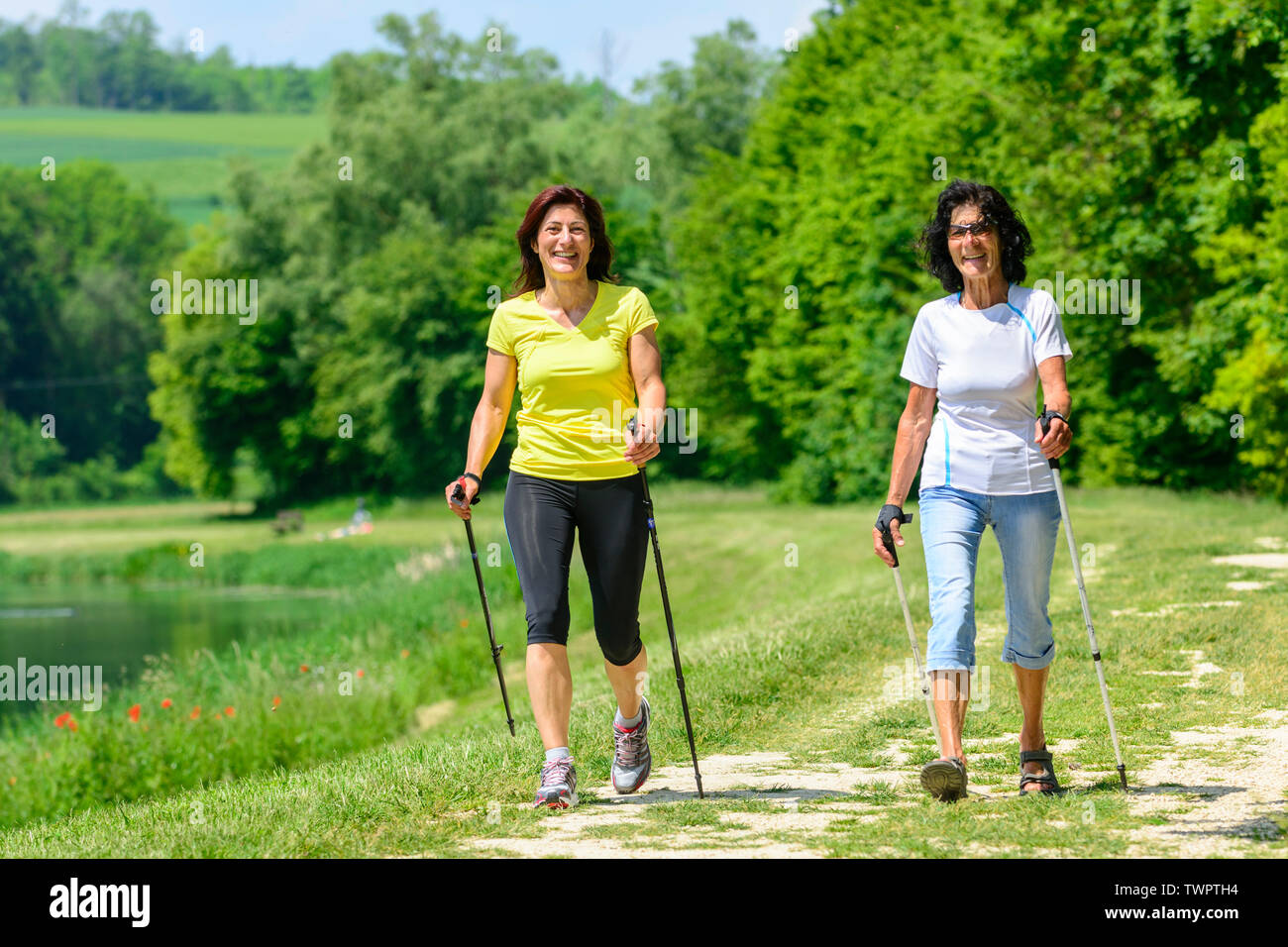 Women walking together lake in hi-res stock photography and images - Alamy