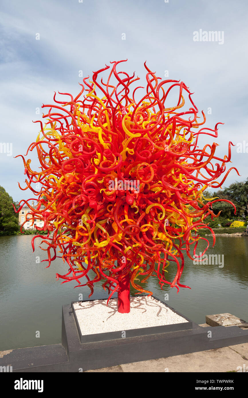 Summer Sun is a glass sculpture by contemporary USA artist Dale Chihuly, located in The Pond at Kew Gardens, Richmond, London, UK. Stock Photo