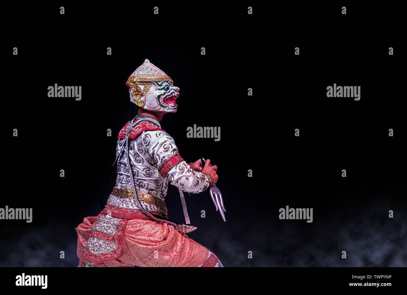 15 May 2019,Bangkok,Thailand.Hanuman monkey actor in ramayana story performance on dark background with smoke banner size. Asia royal art show on Stock Photo