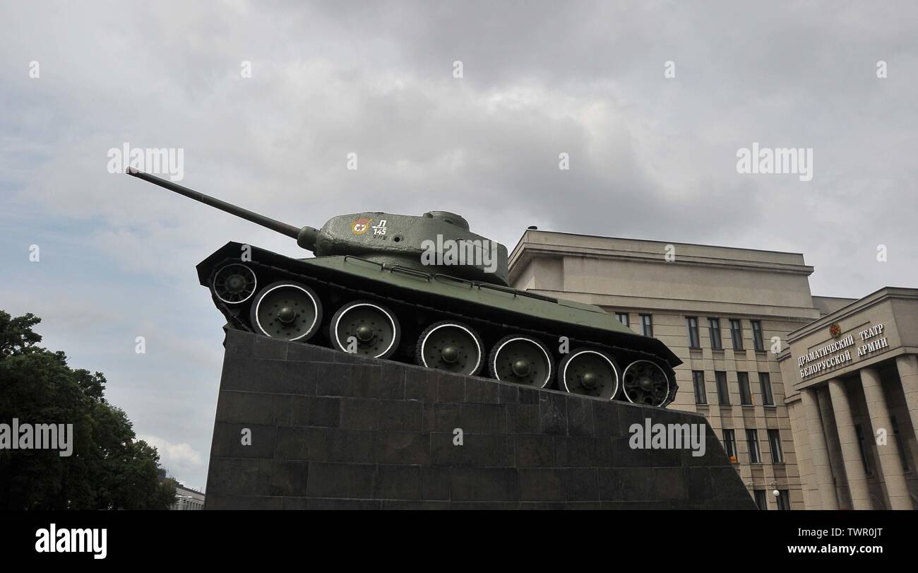 Minsk. Belarus. 22 June 2019. A Russian T34/85 tank on a plinth near The Army Palace stands as a memorial for the liberation of the city from the Nazis in 1944 by the Red Army. Stock Photo