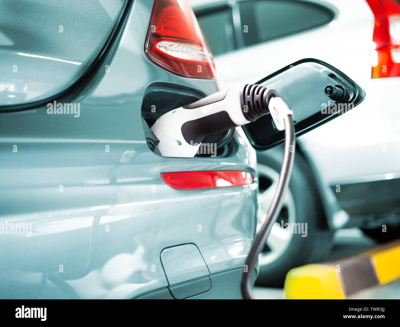 electric car charger cable plug for green battery power. Automotive