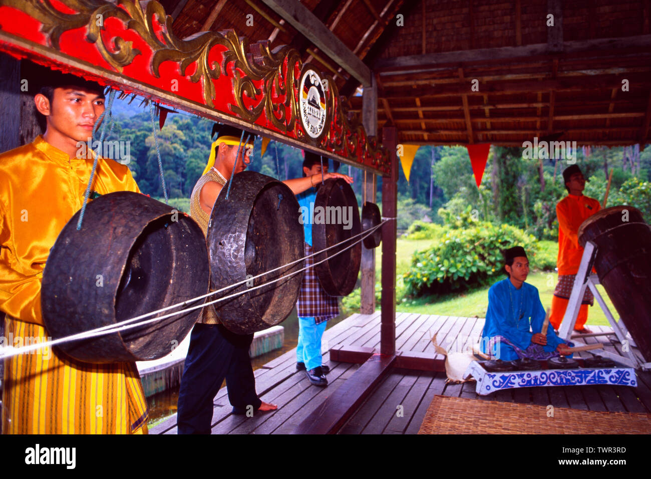 Malaysia/Borneo: Iban Headhunter musicians playing in the rain forest of Sarawak Stock Photo