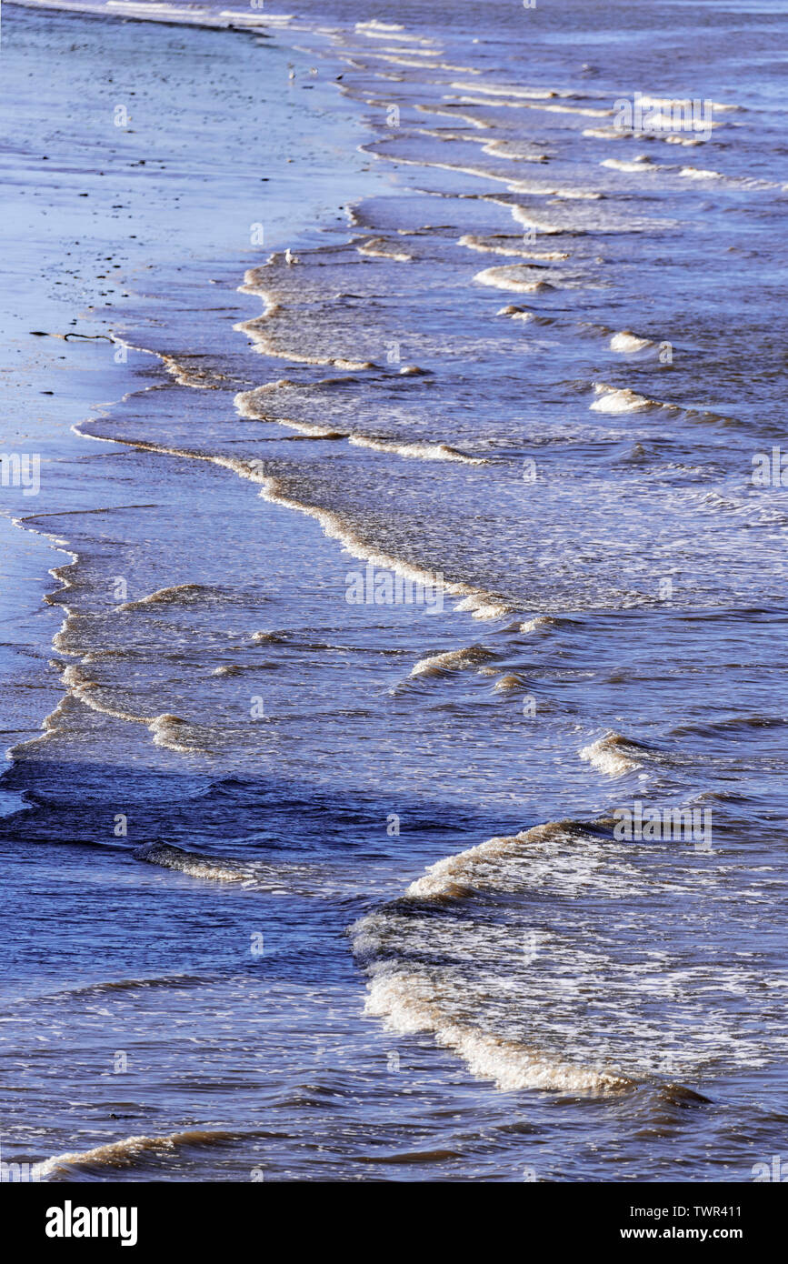 Waves on a beach Stock Photo