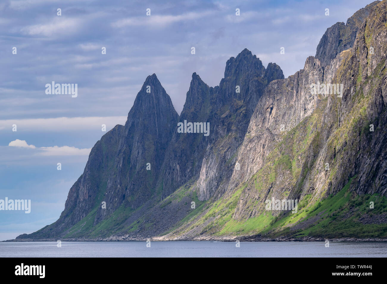 The Devils Jaw, or Tungeneset, is a stunning series of jagged mountain peaks and breathtaking views on the northern Norwegian island of Senja. Stock Photo