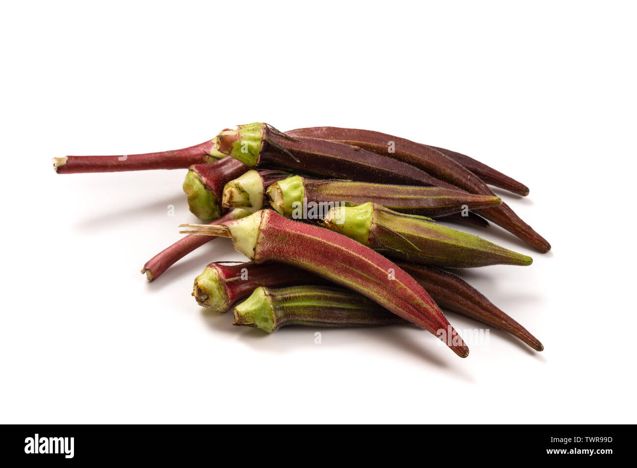 Fresh organic red okra isolated on a white background. Stock Photo