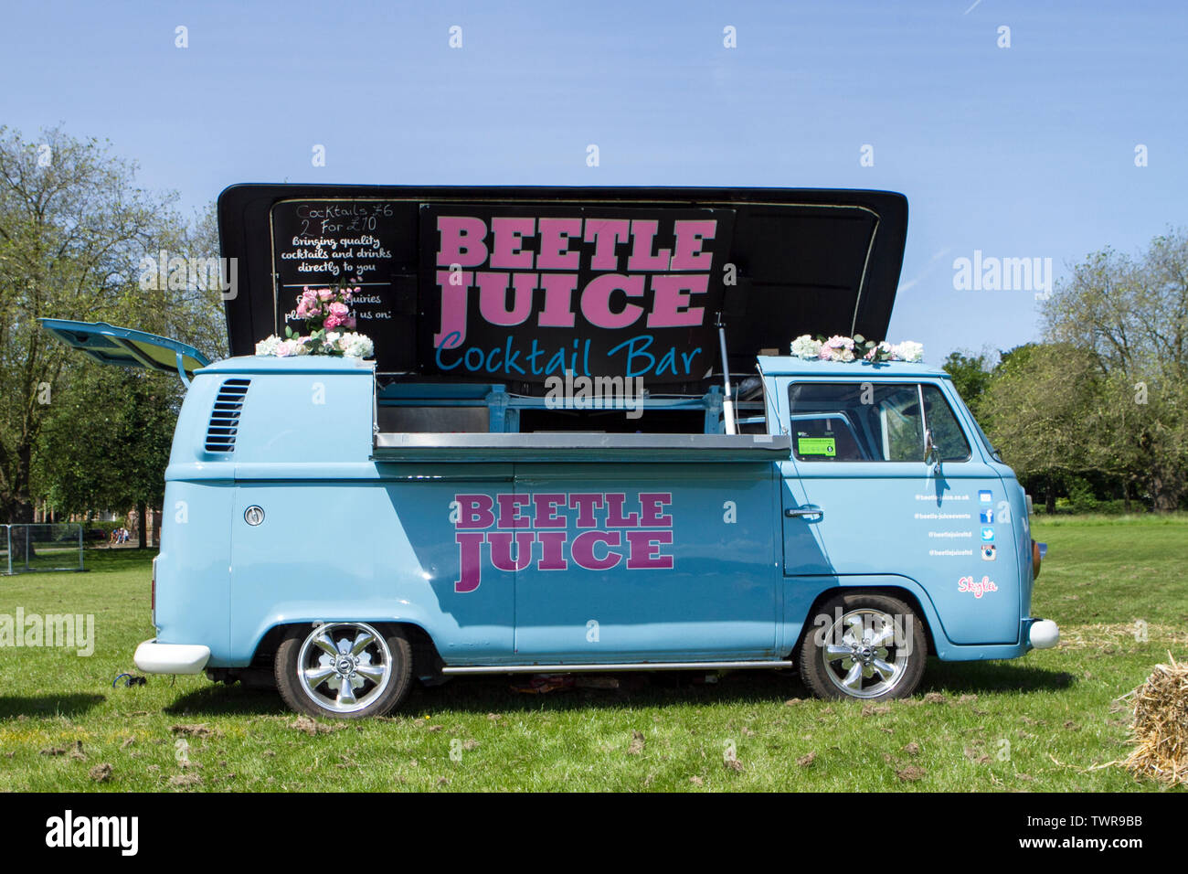 A Volkswagen camper van converted into a mobile bar selling alcoholic drinks  Stock Photo - Alamy