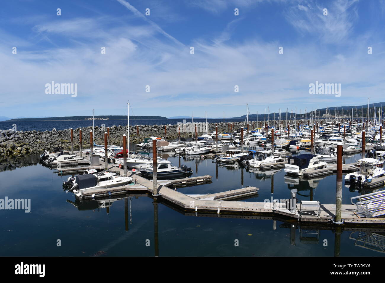 Boats moored at Westview Harbour in Powell River, BC Stock Photo