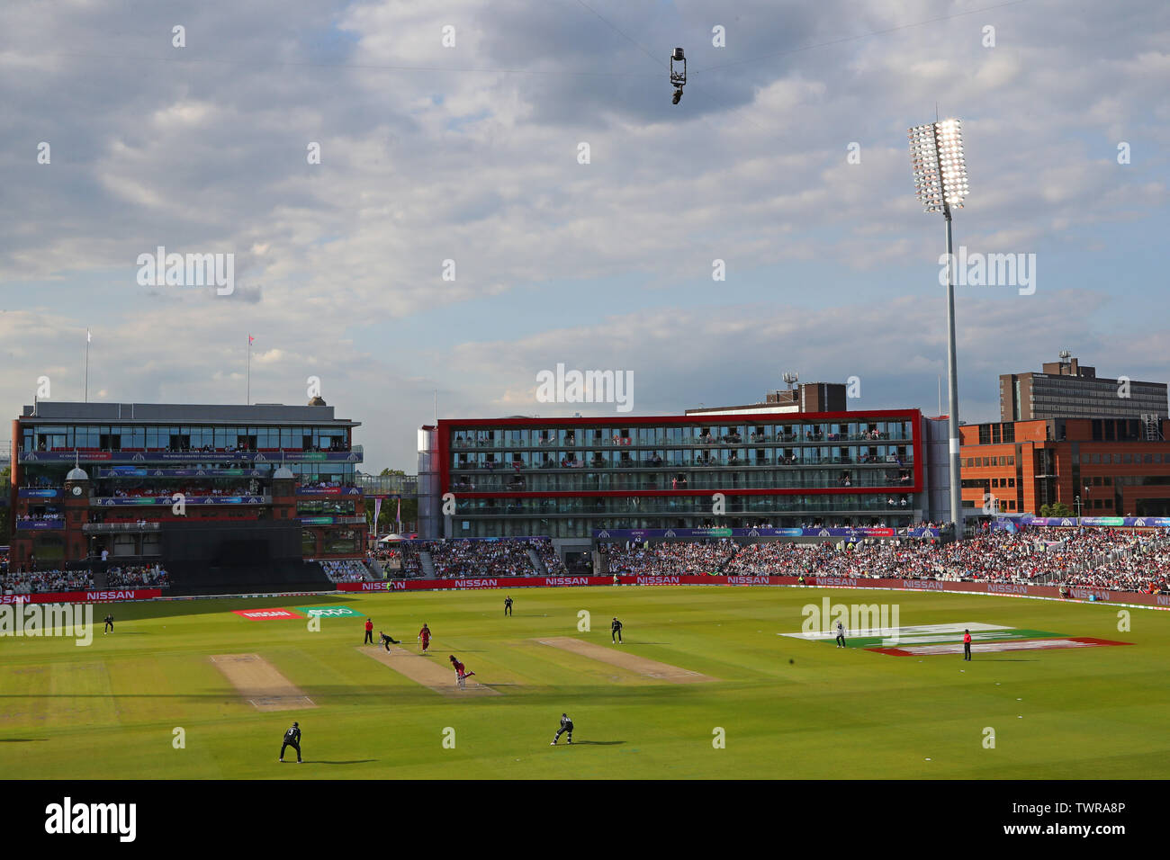 MANCHESTER, ENGLAND. 22 JUNE 2019: A general view as Trent Boult of New Zealand bowls at Chris Gayle of West Indies during the West Indies v New Zealand, ICC Cricket World Cup match, at Old Trafford, Manchester, England. Stock Photo