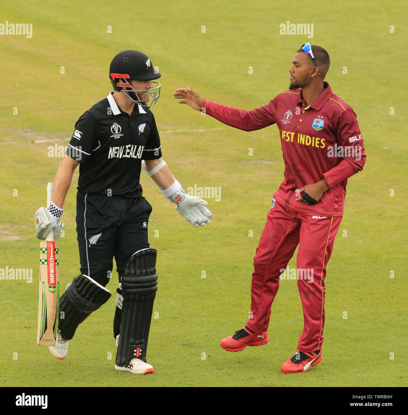 MANCHESTER, ENGLAND. 22 JUNE 2019: Nicholas Pooran of West Indies congratulates Kane Williamson of New Zealand after he was dosmissed for his best ODI score of 148 runs during the West Indies v New Zealand, ICC Cricket World Cup match, at Old Trafford, Manchester, England. Stock Photo