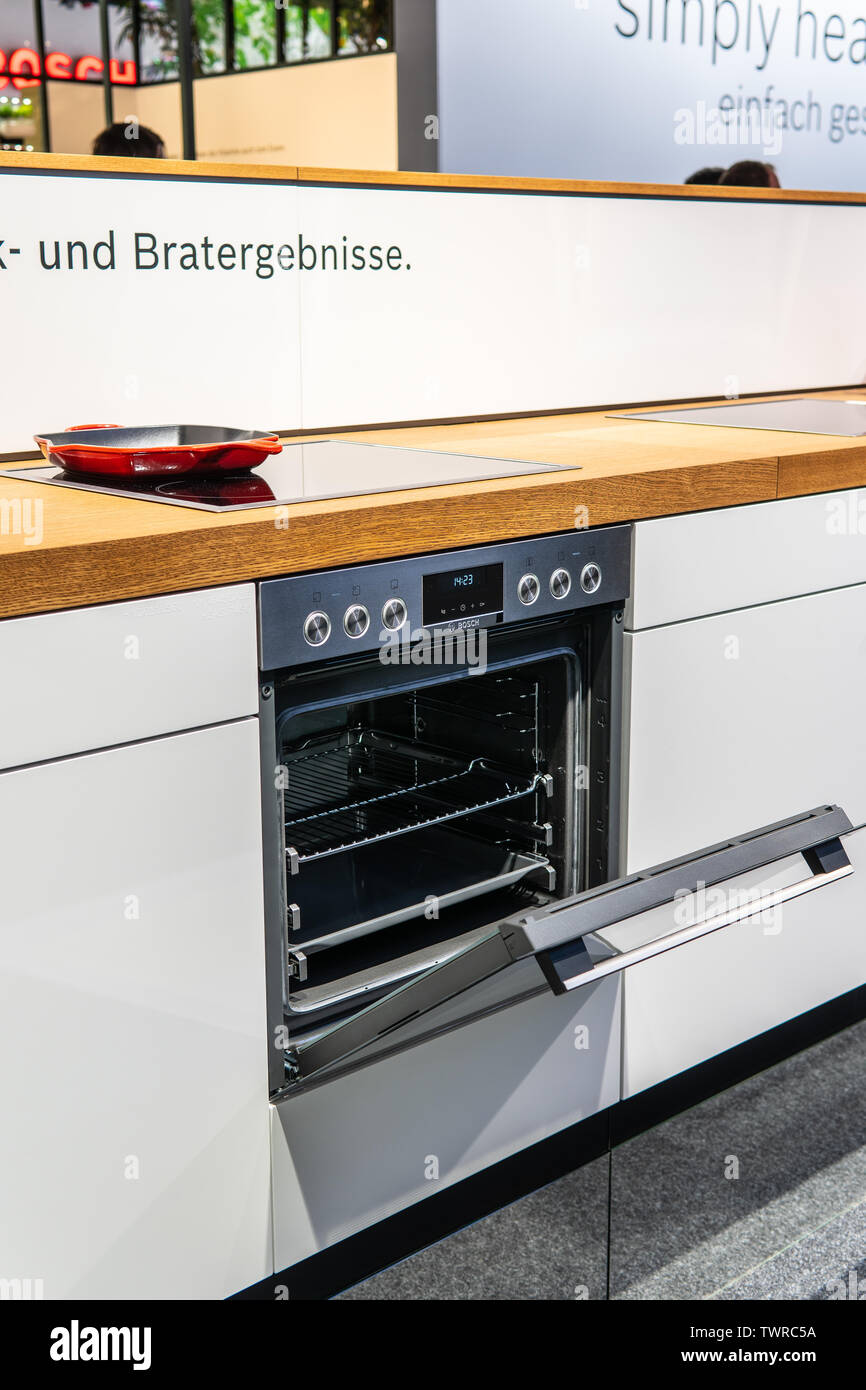 Bosch kitchen showroom with home appliances dishwasher, induction hobs