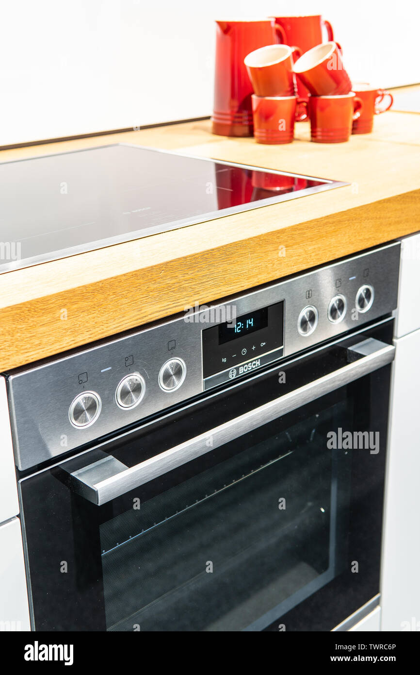 Bosch kitchen showroom with home appliances dishwasher, induction hobs