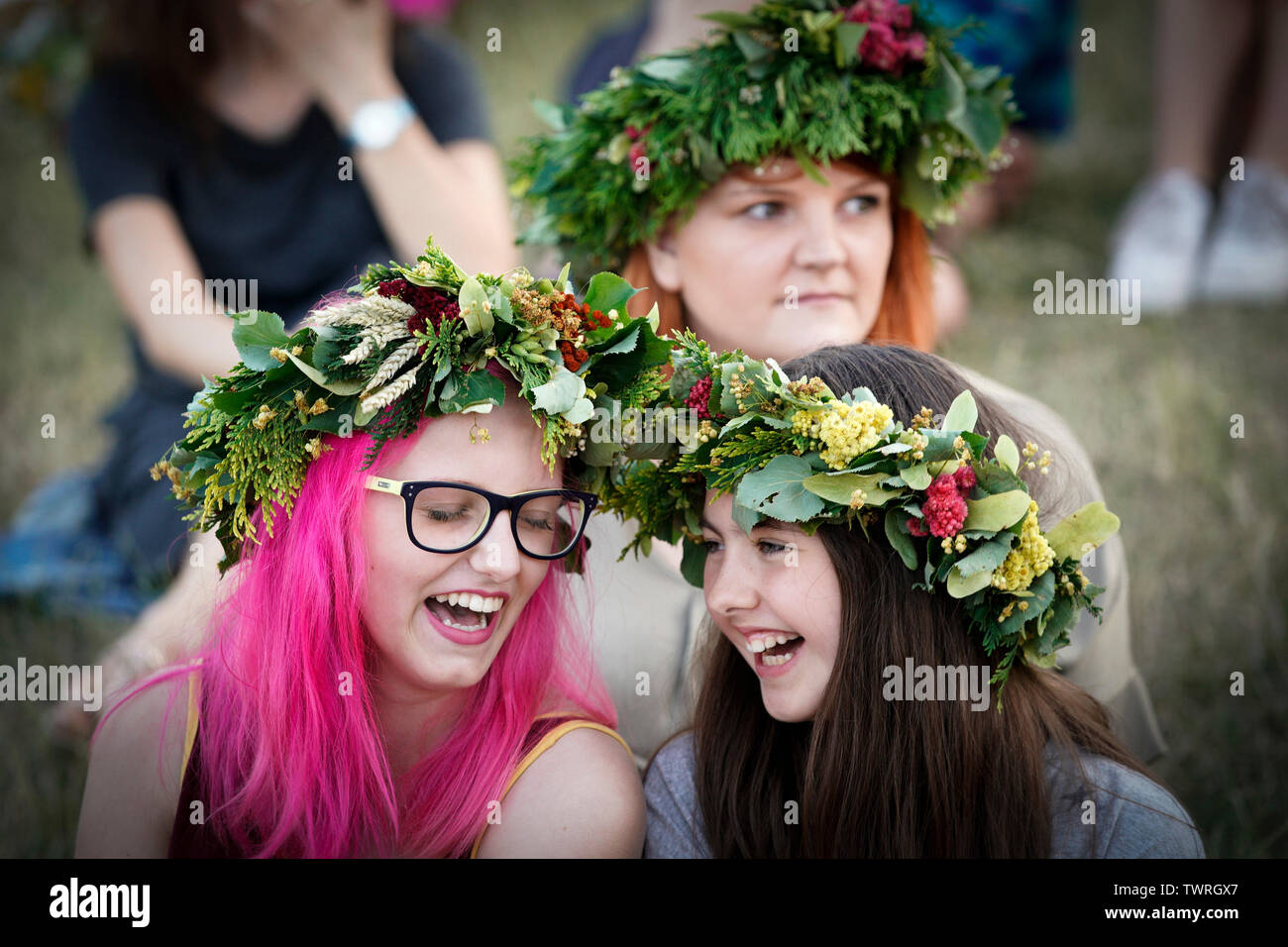Warsaw, Poland. 22nd June, 2019. People wearing flower wreaths participate  in Wianki celebrations in Warsaw, Poland, on June 22, 2019. Wianki is a  tradition of floating handmade wreaths down the river to