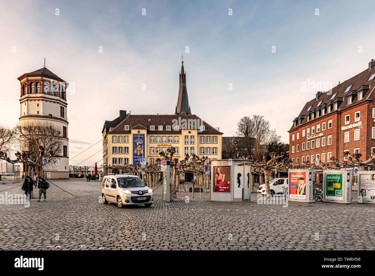 Dusseldorf, Germany – Jan 29, 2018: View at Castle tower now Maritime Museum and brewery building, at Burgplatz square next to River Rhine in Dusseldo Stock Photo