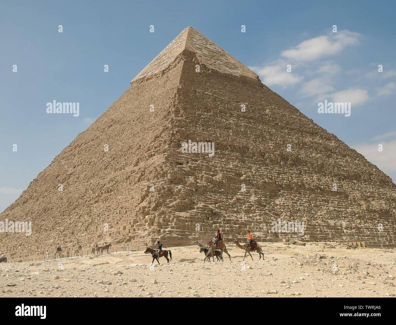 pyramid of khafre and camel riders at giza near cairo, egypt Stock ...