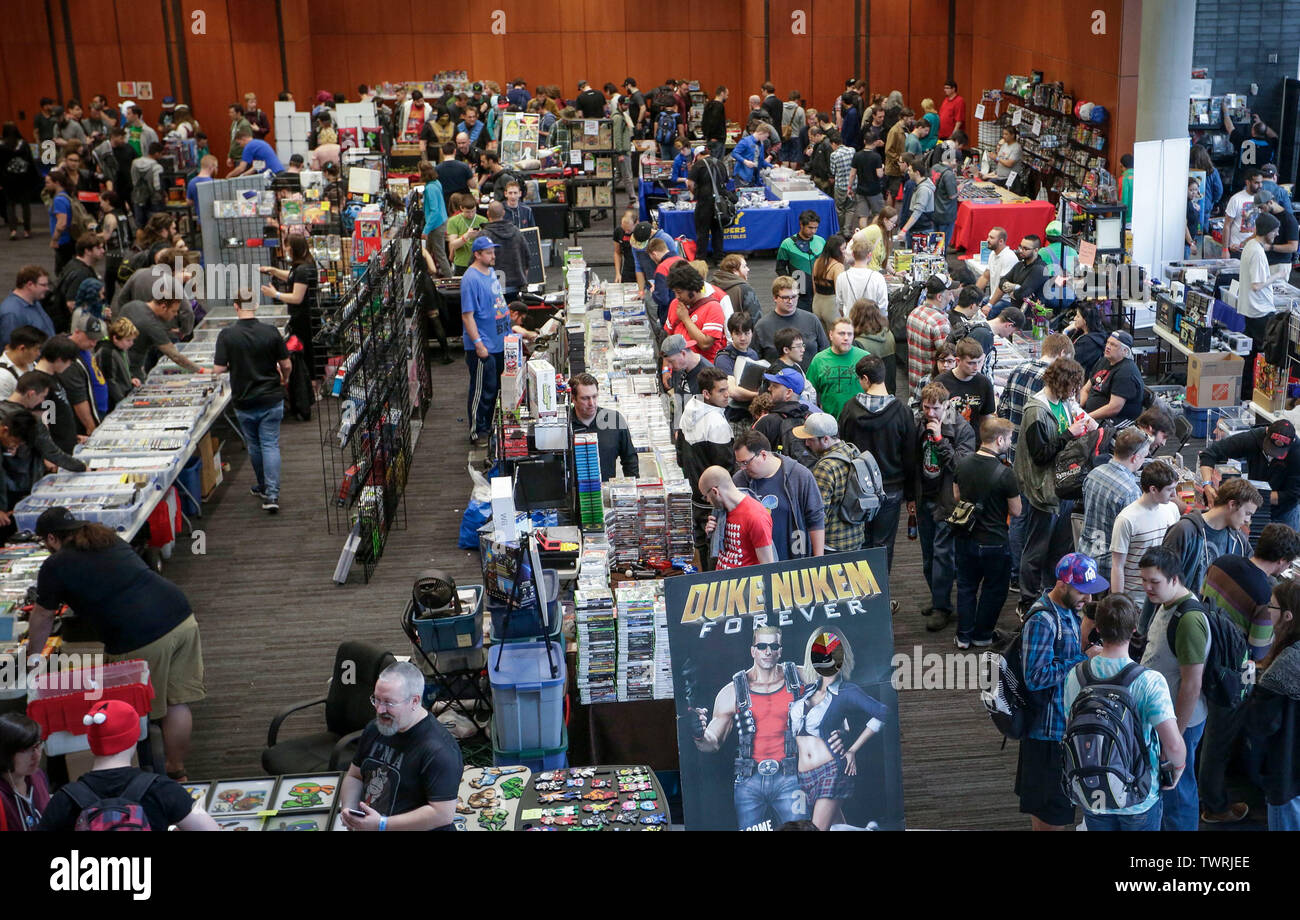 Vancouver, Canada. 22nd June, 2019. People visit the Vancouver Retro Gaming Expo in New Westminster, Canada, June 22, 2019. The Vancouver Retro Gaming Expo was held at the Anvil Centre on Saturday, offering different collections of video games, consoles and collectibles from 1970s to 1990s. Credit: Liang Sen/Xinhua/Alamy Live News Stock Photo