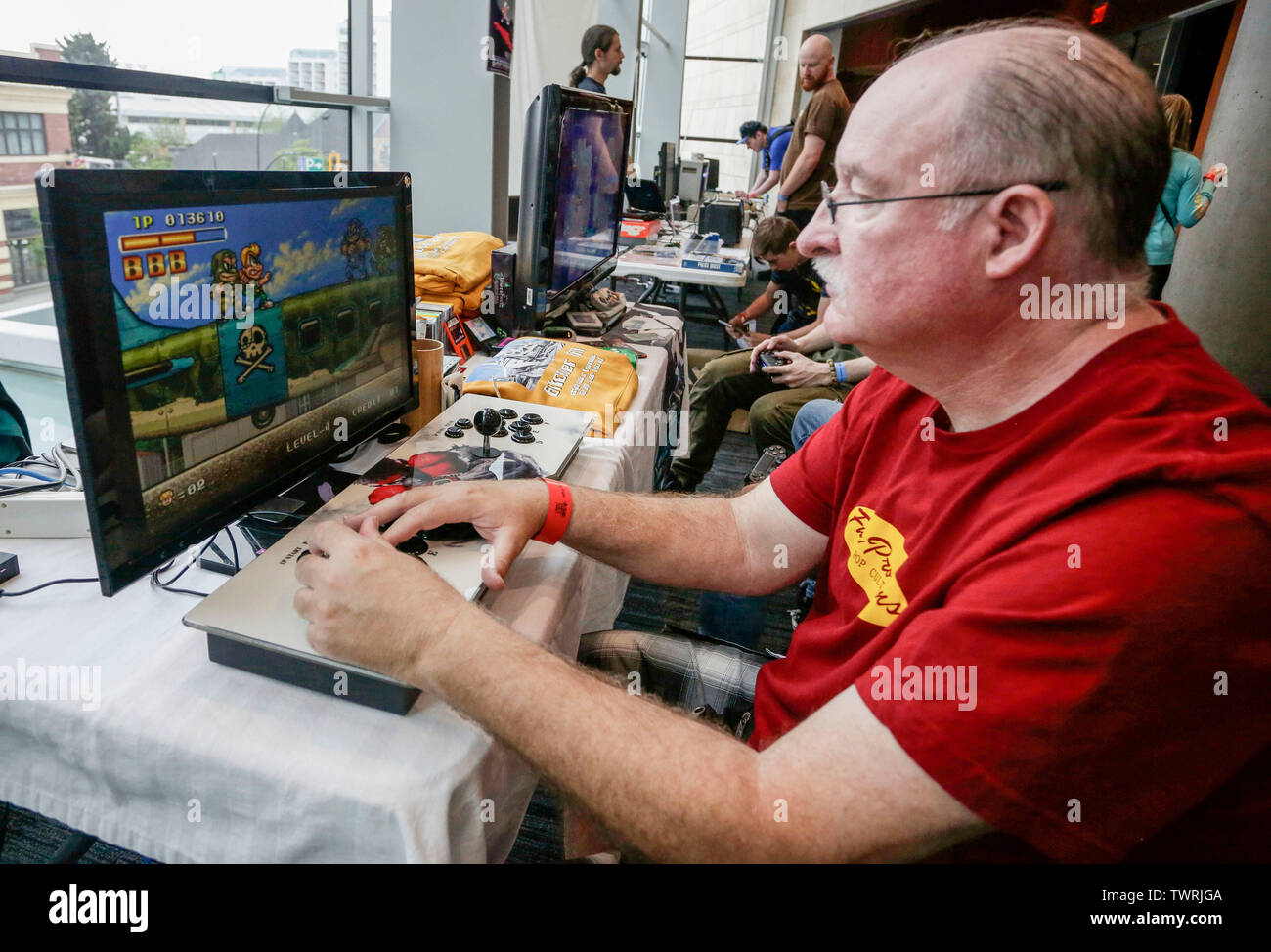 Vancouver Canada. 22nd June 2019. A visitor tries a computer