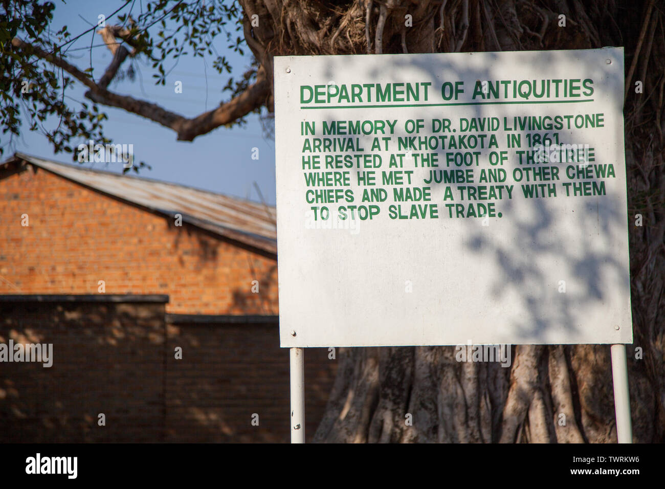 A Sign in Nkhota-Kota marking the tree where Dr David Livingstone sat and discussed with the local chiefs to end slave trade in Malawi Stock Photo