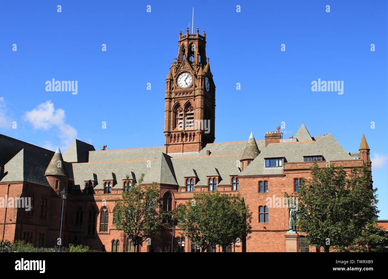 UK BarrowInFurness, Cumbria. Town Hall and Town Hall clock with blue