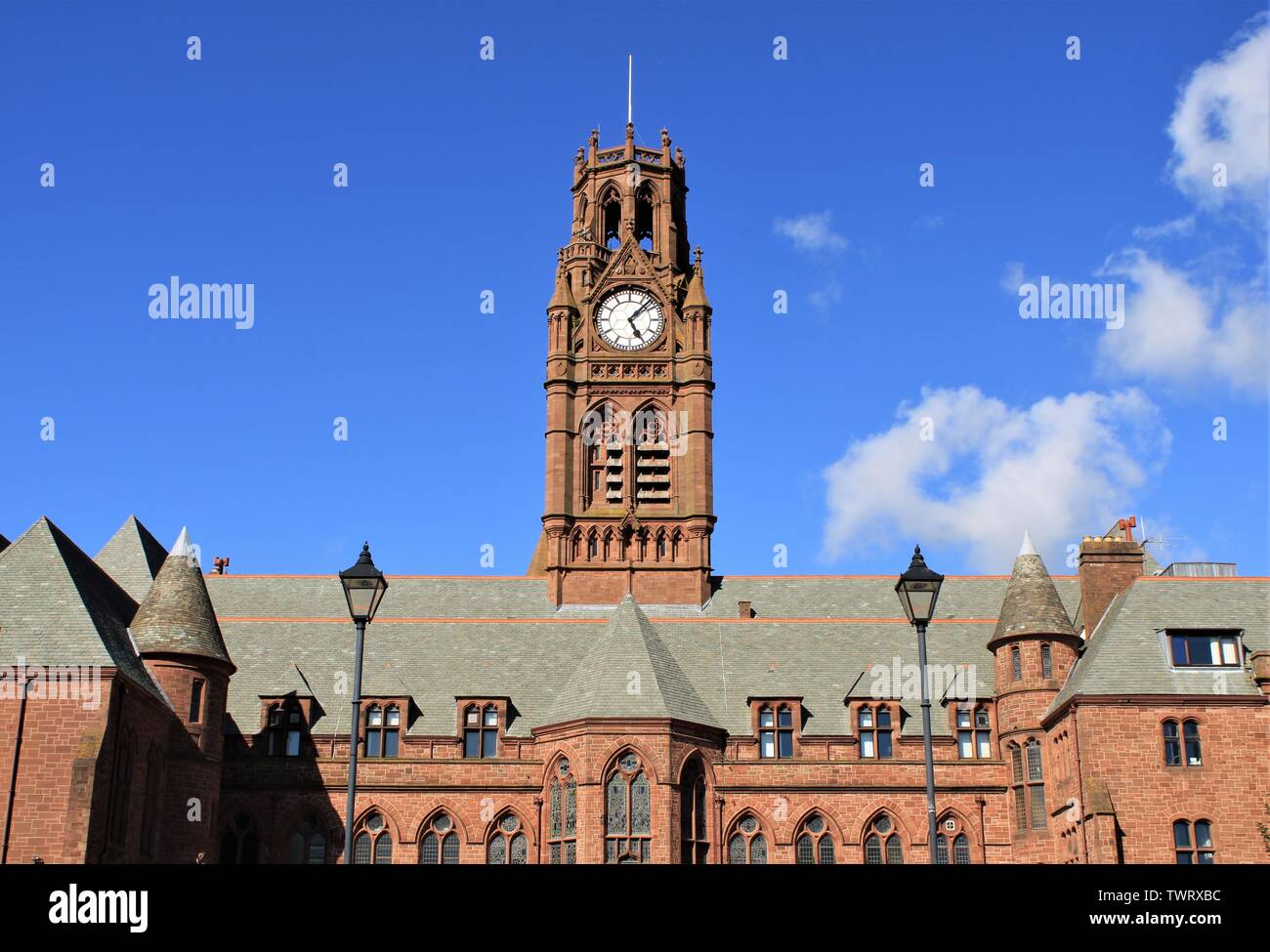 UK BarrowInFurness, Cumbria. Town Hall and Town Hall clock with blue