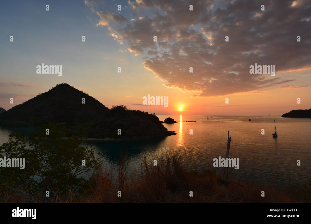 Sunset over Labuan Bajo, Flores Island, Indonesia Stock Photo - Alamy