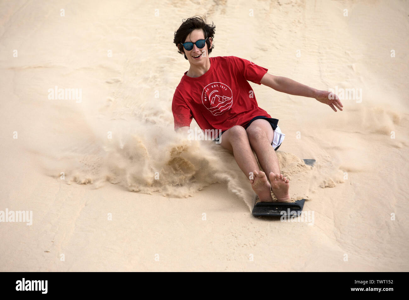 Sand Surfing, Stockton Beach, NSW, Australia Stock Photo
