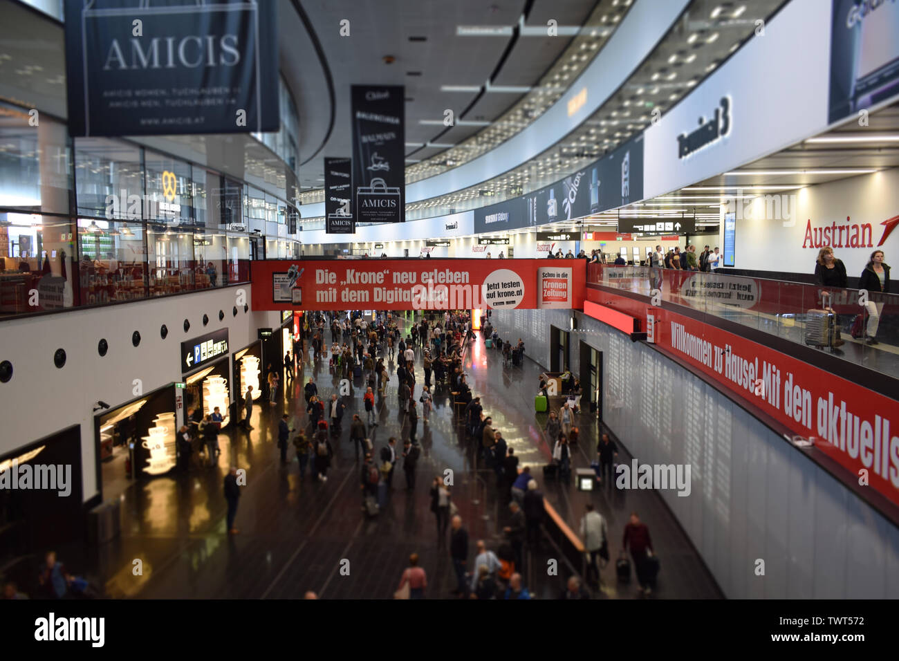 Vienna, Austria: May/20/2019 - Vienna International Airport (built in 1938 and the largest airport in Austria). People waiting for the arrivals. Stock Photo